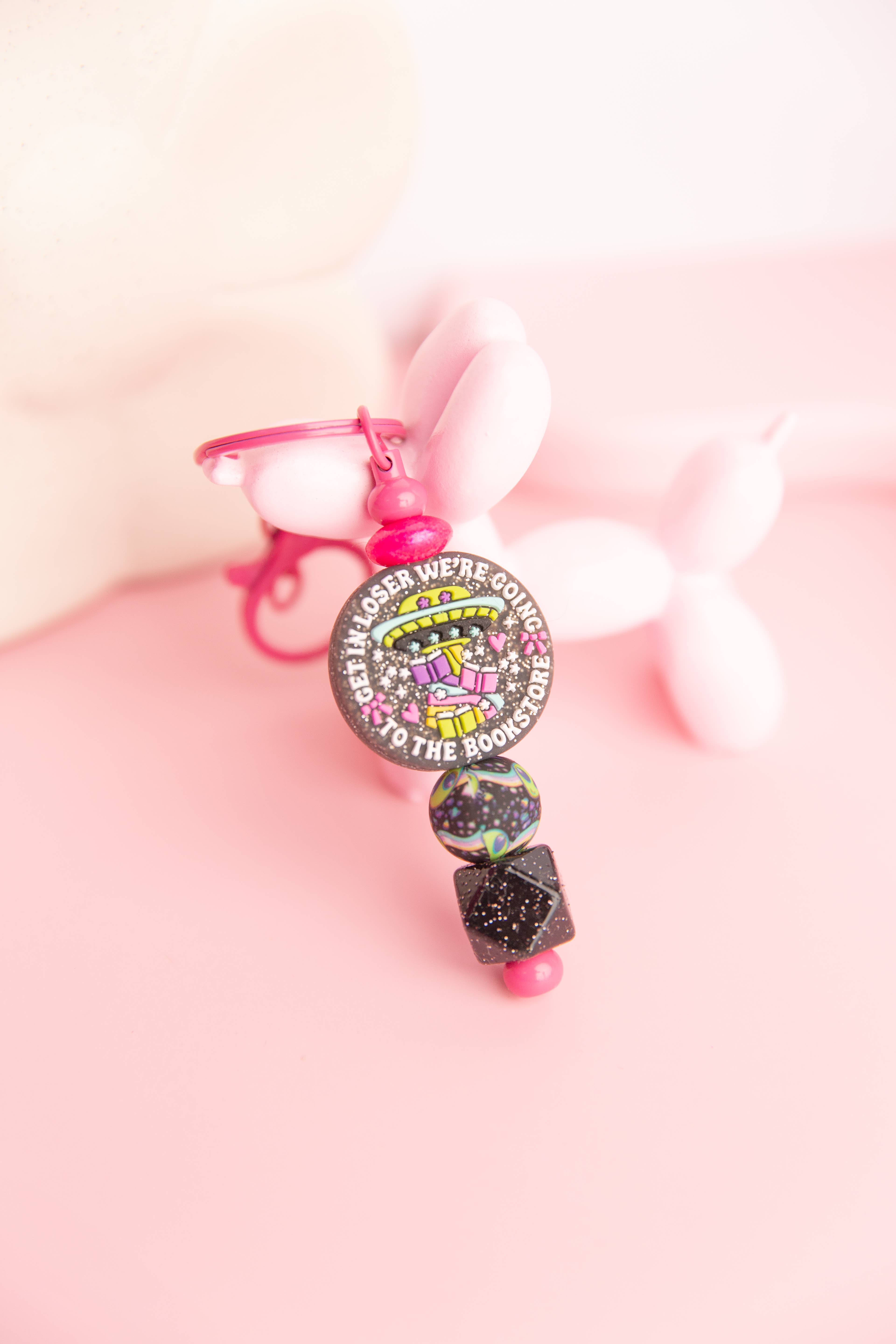 The Blush Hut - Wholesale Keychain - Women's - Get in Loser Keychain – Book Lover Accessory1