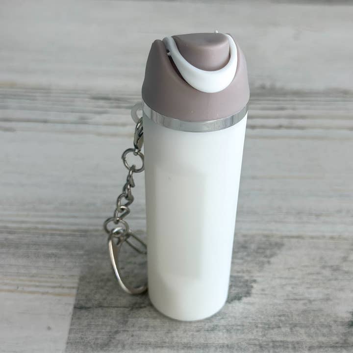 Harris Girls & Co. – Engroshandel Nøglering - Dame – Owal nøglering "Hvid Tan"0