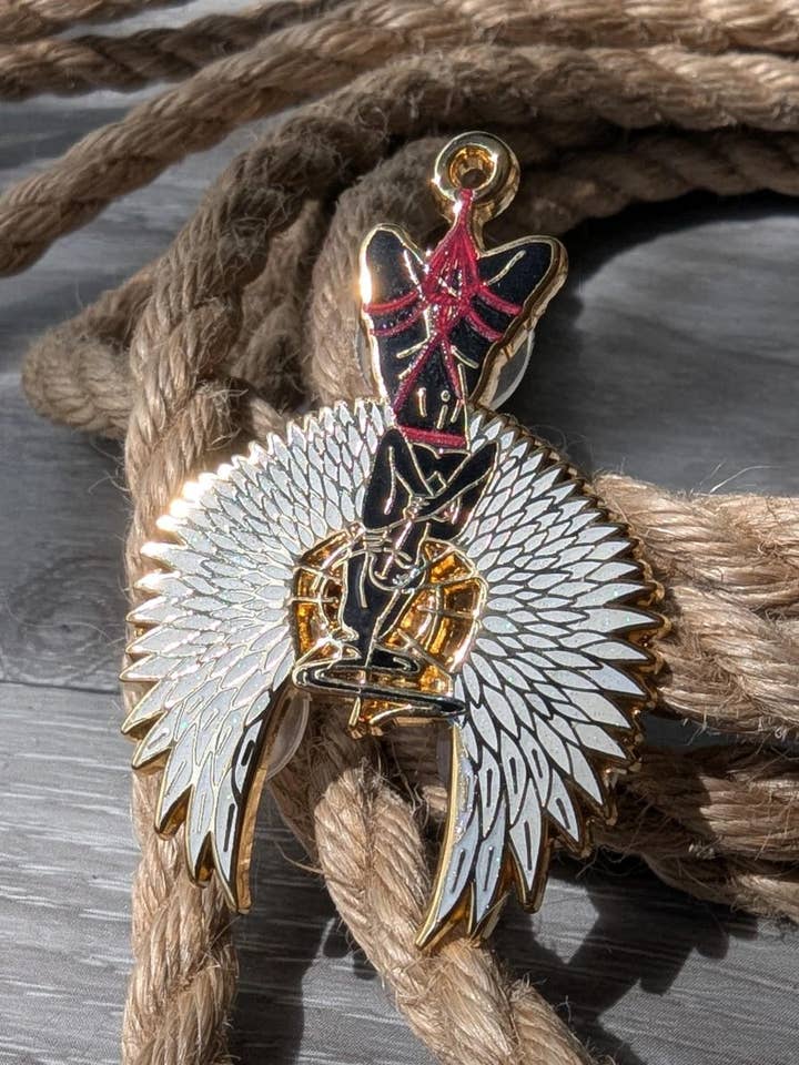 Divine Suspension Shibari enamel pin, rope label badge for wholesale by Geek and Artsy