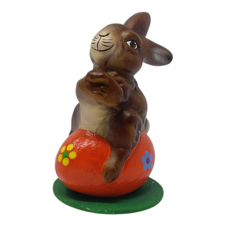 Pinnacle Peak Trading - Wholesale Decorative Figurine - Ino Schaller Easter Bunny on Orange Egg German Paper Mache