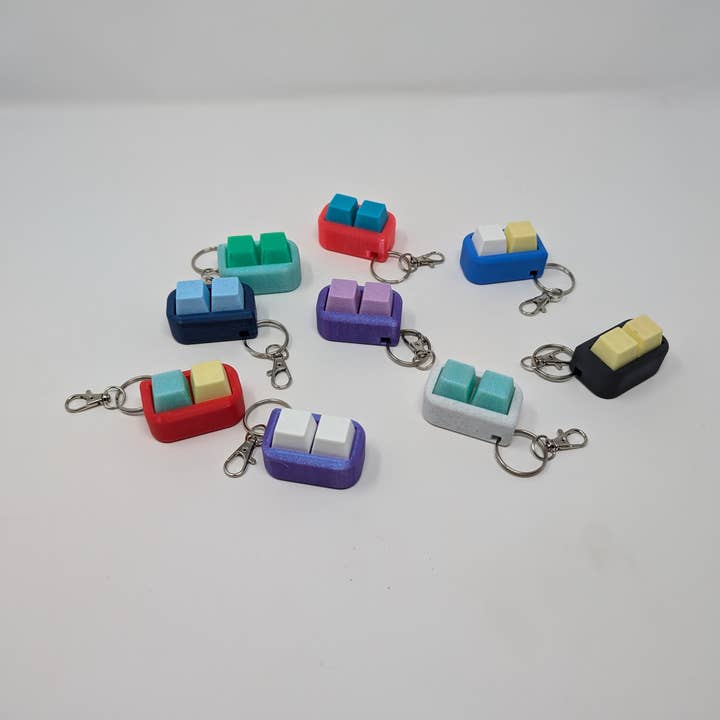 Mechanical Key Clicker Fidget Keychain Toy for wholesale by Giant Turtle Creations