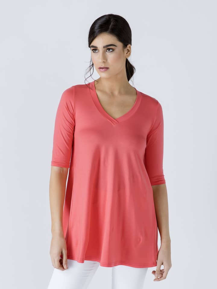 V-hals top med crepe detaljer for engroshandel hos conquista