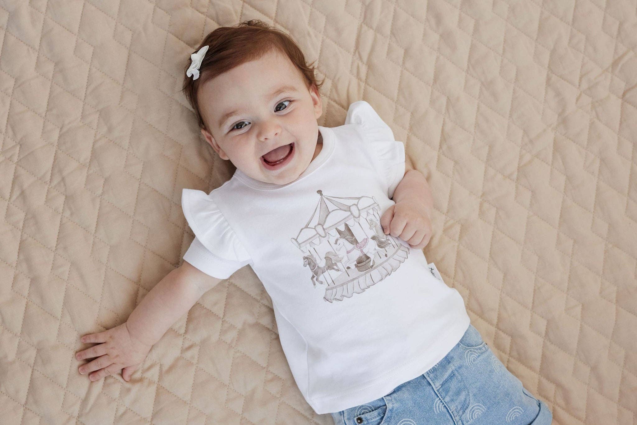 White Carousel Print Flutter Tee for wholesale on Faire1