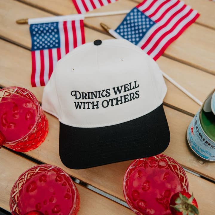 Black and Tan Drinks Well With Others Vintage Trucker Hats For Women for wholesale on Faire