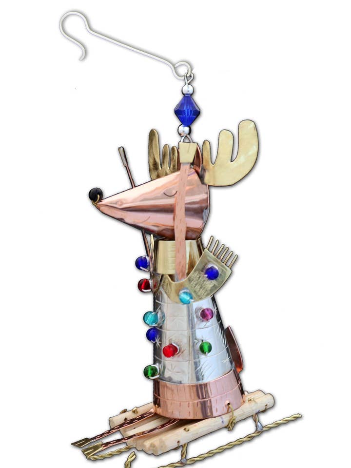 Sledding Reindeer Ornament for wholesale by Pilgrim Imports