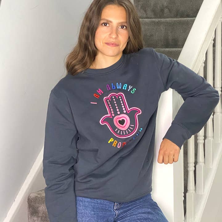 SAMPLE SALE 2026 - 'Hamsa' I Am Protected Organic Steel Grey Sweatshirt - SMALL for wholesale by Percy and Nell Retail Limited