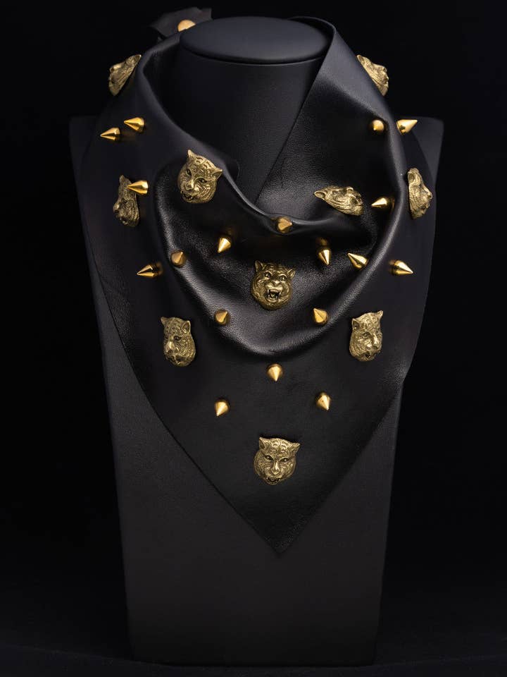 Shiny Black Leather with Gold Leopards and Spikes for wholesale by Wybo Design