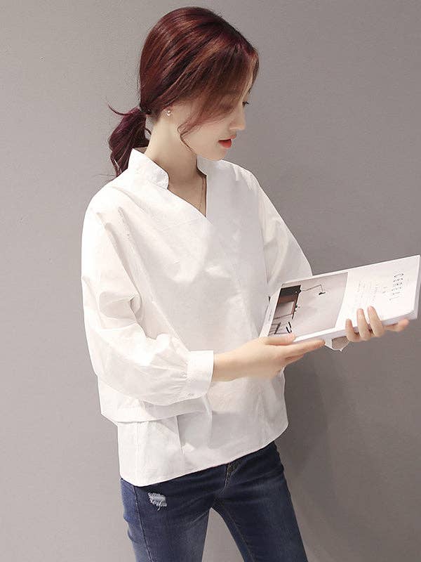 VividLux - Venta al por mayor Blusa - Mujer - Blusa Urban de color liso con cuello alto4