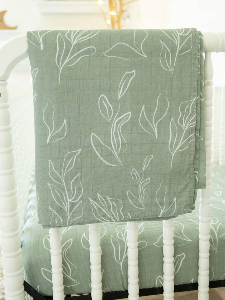 Natural Oasis Willow Organic Bamboo Cotton Muslin Swaddle Blanket for wholesale by Cradle Comforts Co.