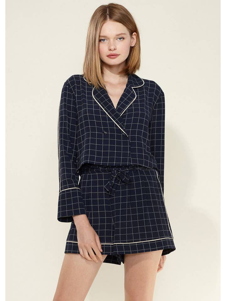 Nurode's Grid Print Blouse in Navy Plaid for wholesale on Faire