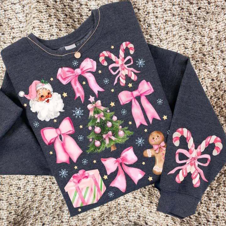 Sweat-shirt avec nœuds roses de Noël et cannes en sucre pour la vente par StricklandDesignCo