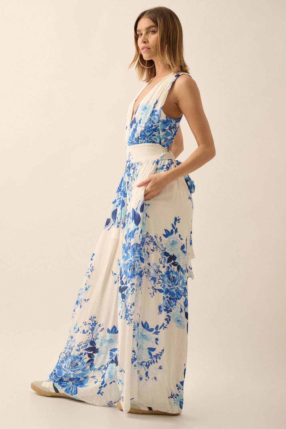 Off White Blue Plunging Neck Floral Woven Jumpsuit for wholesale on Faire5