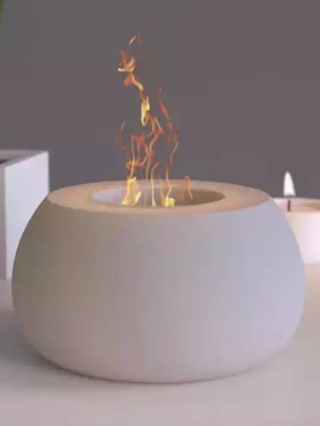 Concrete Tabletop Firepit for wholesale by Made On Galveston