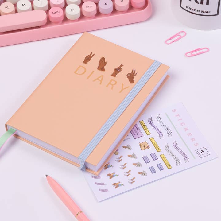 Das undatierte Handy Lil Tagebuch (Koralle) für den Großhandel von KitsCH Noir