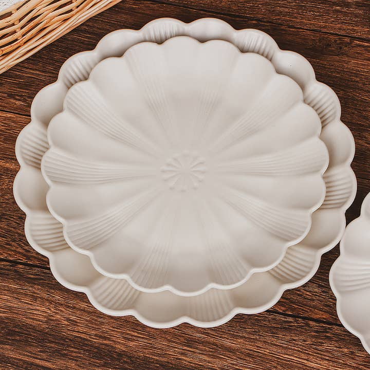 Sæt med cloud-tallerkener for engroshandel hos Seline Decor