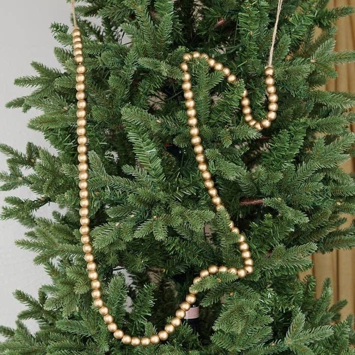Holiday Depot Inc. - Wholesale Bunting/Garland - M29810- 5FT WOODEN BEADS STRING-GOLD