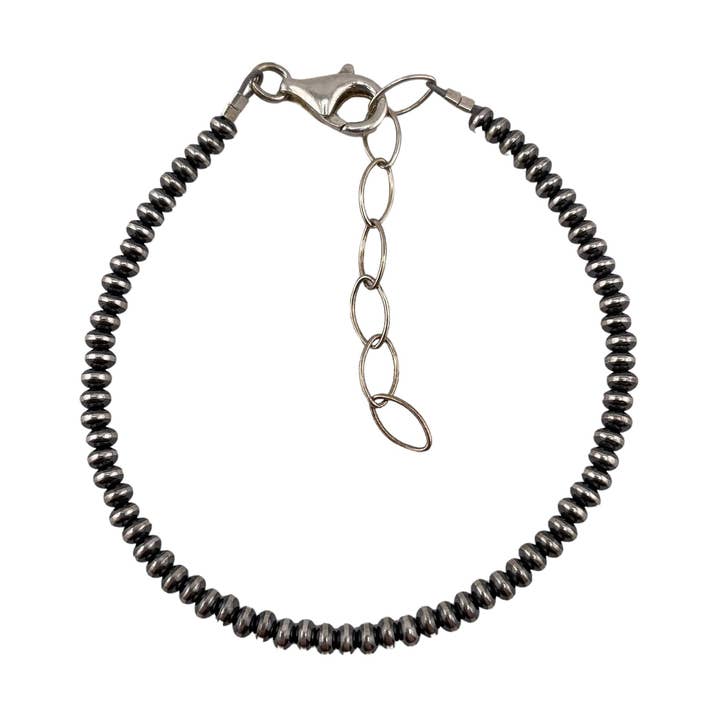 Sterling Silver Navajo Pearl Oxidize Saucer pärlarmband med förlängningskedja. Finns från 3mm till 9mm för wholesale av Select Lines