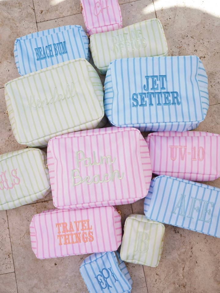 Collection de trousses de maquillage rayées en nylon pour la vente par KENZKUSTOMZ