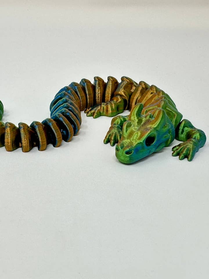 Rainbow Colored Articulated Skeleton Dragon for wholesale by Shape Shifter Studio 3D