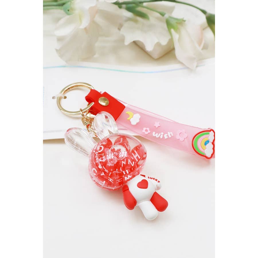 RED Floating Letter Cube Rabbit Key Chain for wholesale on Faire2