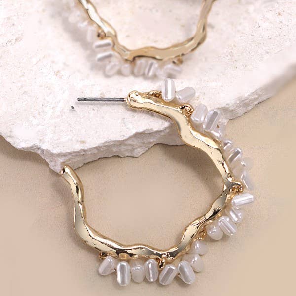 Gold IRREGULAR SHAPE PEARL SEED BEAD EARRINGS | 31E24463 for wholesale on Faire