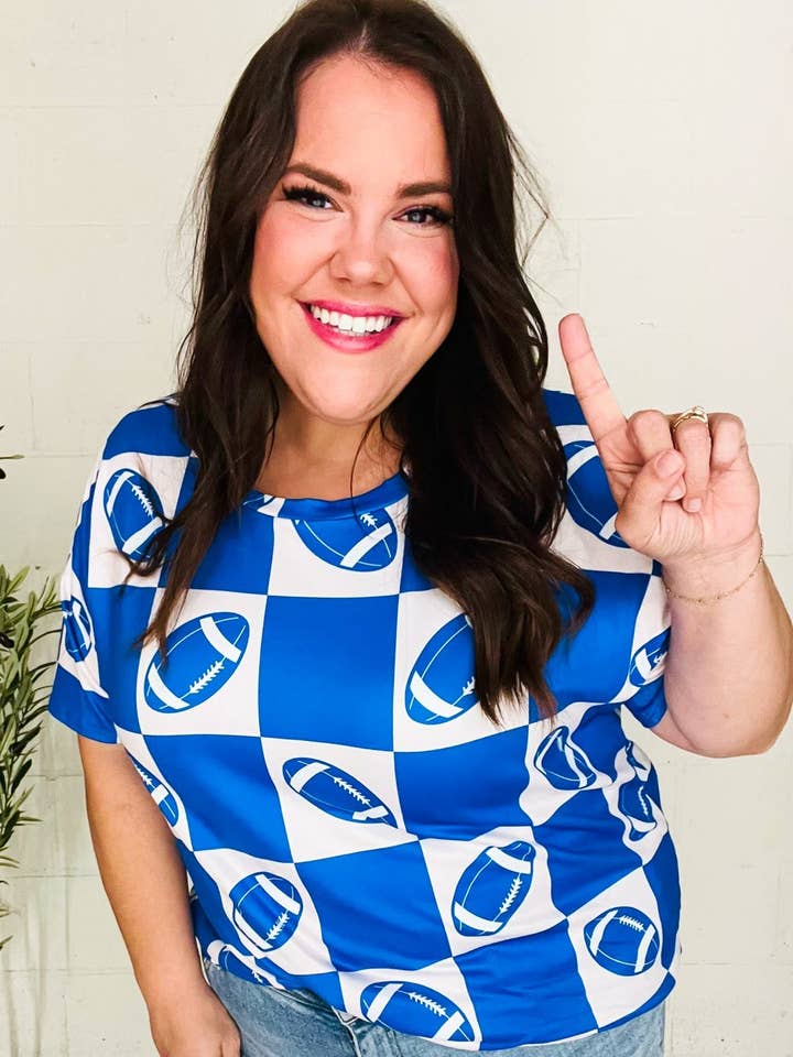 Turn Up The Volume blauwe top met voetbalruitjesprint (open verpakking) voor wholesale door Promenade