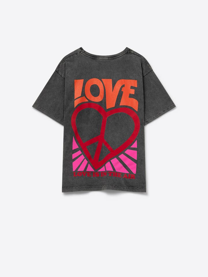 Black T-Shirt with Love is Air and Heart with Peace logo for wholesale on Faire1