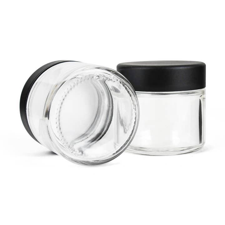 2oz/60ml Clear Glass Jar With Black Child Resistant Caps for wholesale by Human Objects®