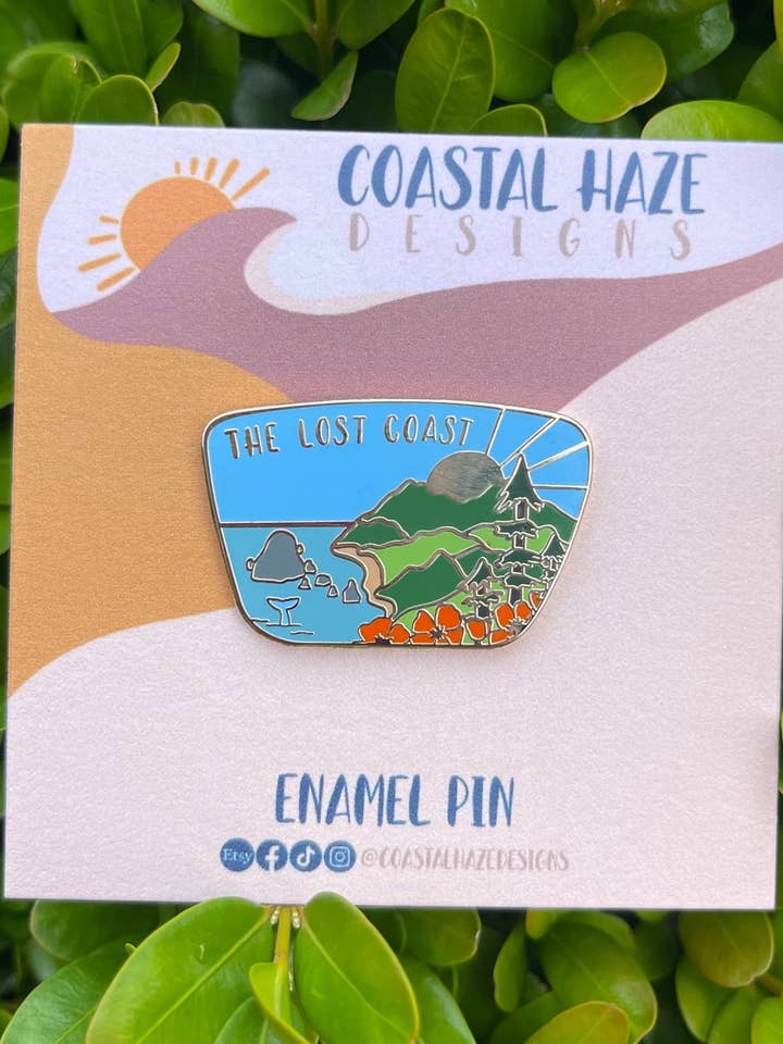 The Lost Coast Hard Enamel Pin for wholesale by Coastal Haze Designs