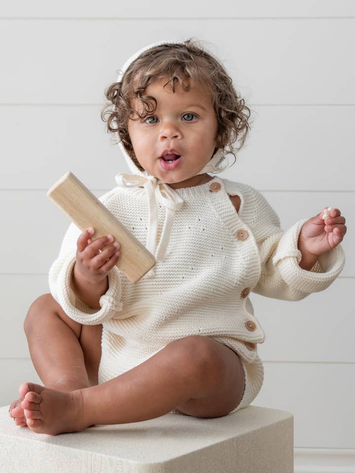 Cloud Creme Romper with matching bonnet for wholesale by Yooushi