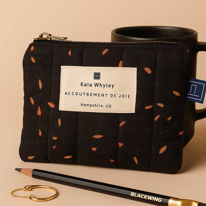 Black orange and red Spotty print design accessories pouch 3 sizes for wholesale by Kate Whyley