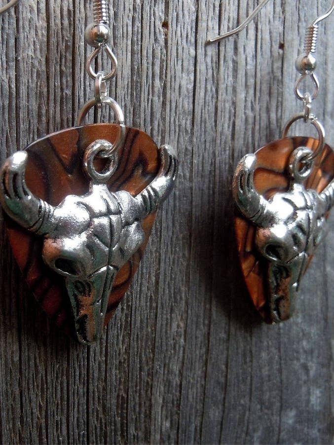 Store dyr kraniet Guitar Pick øreringe for engroshandel hos Simply Raevyn