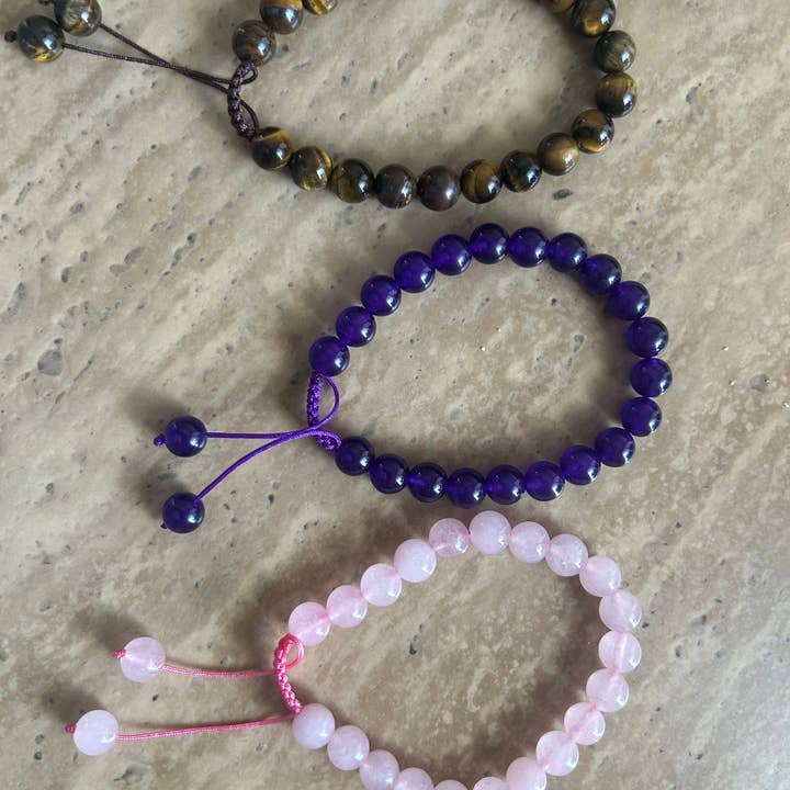 8mm Stone bracelets with rope to adjust the size for wholesale by Siman International Inc.