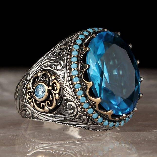 Big Blue Topaz Ring with Turquoise Stone Ornaments for wholesale by Ephesus Jewelry