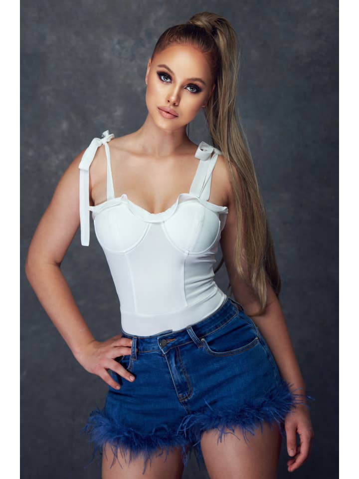 ivory Ruffled Hem Bodysuit for wholesale on Faire