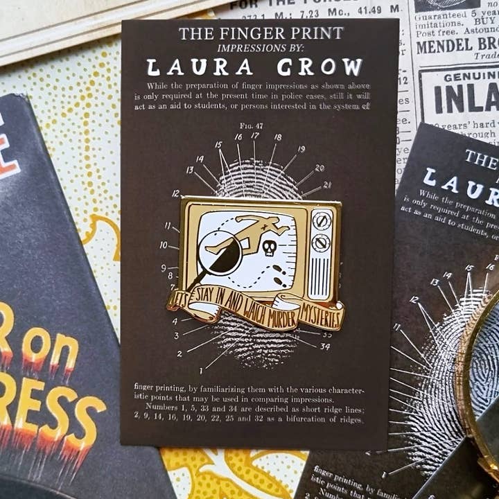 Murder Mystery Enamel Pin 'Watch Murder Mysteries' for wholesale by Laura Crow Illustration