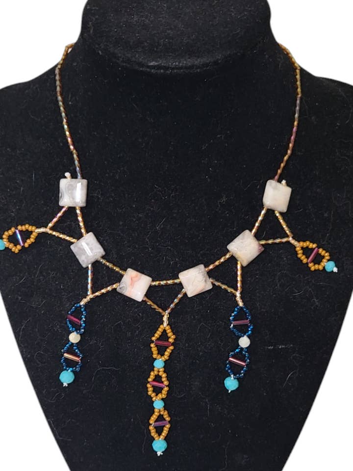 Crazy Lace Agate Delphic Helix Necklace for wholesale by Tsuga Beadwork