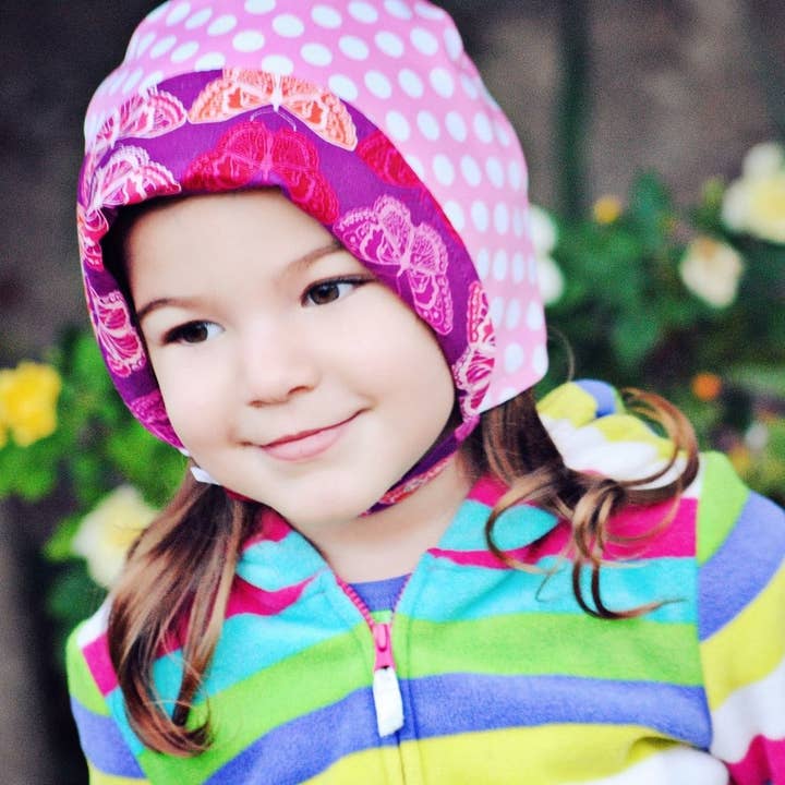 Water Play Bonnet in Flirt (rain hat version) for wholesale by Urban Baby Bonnets