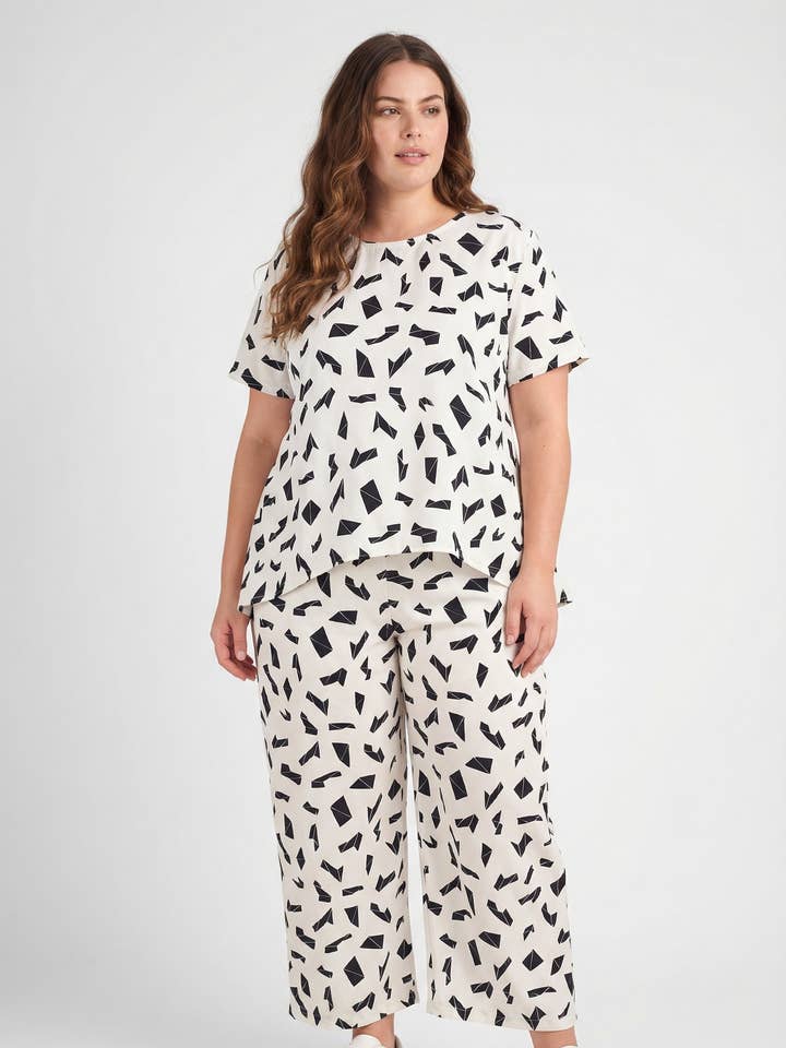 Conjunto de top + saia de tamanho grande estampado branco (PC6198) por atacado de Pomme Rouge Paris