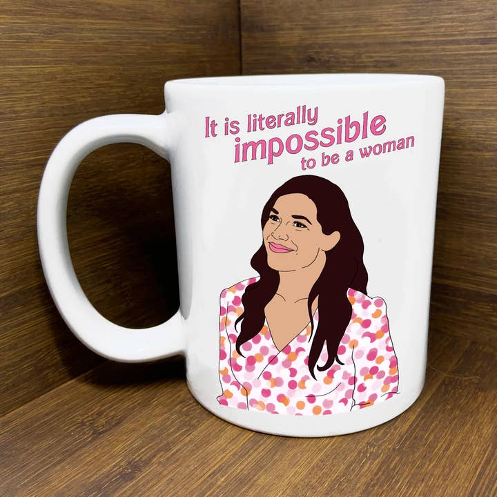 Gloria (Barbie) It is Literally Impossible to be a Woman Mug for wholesale by Citizen Ruth
