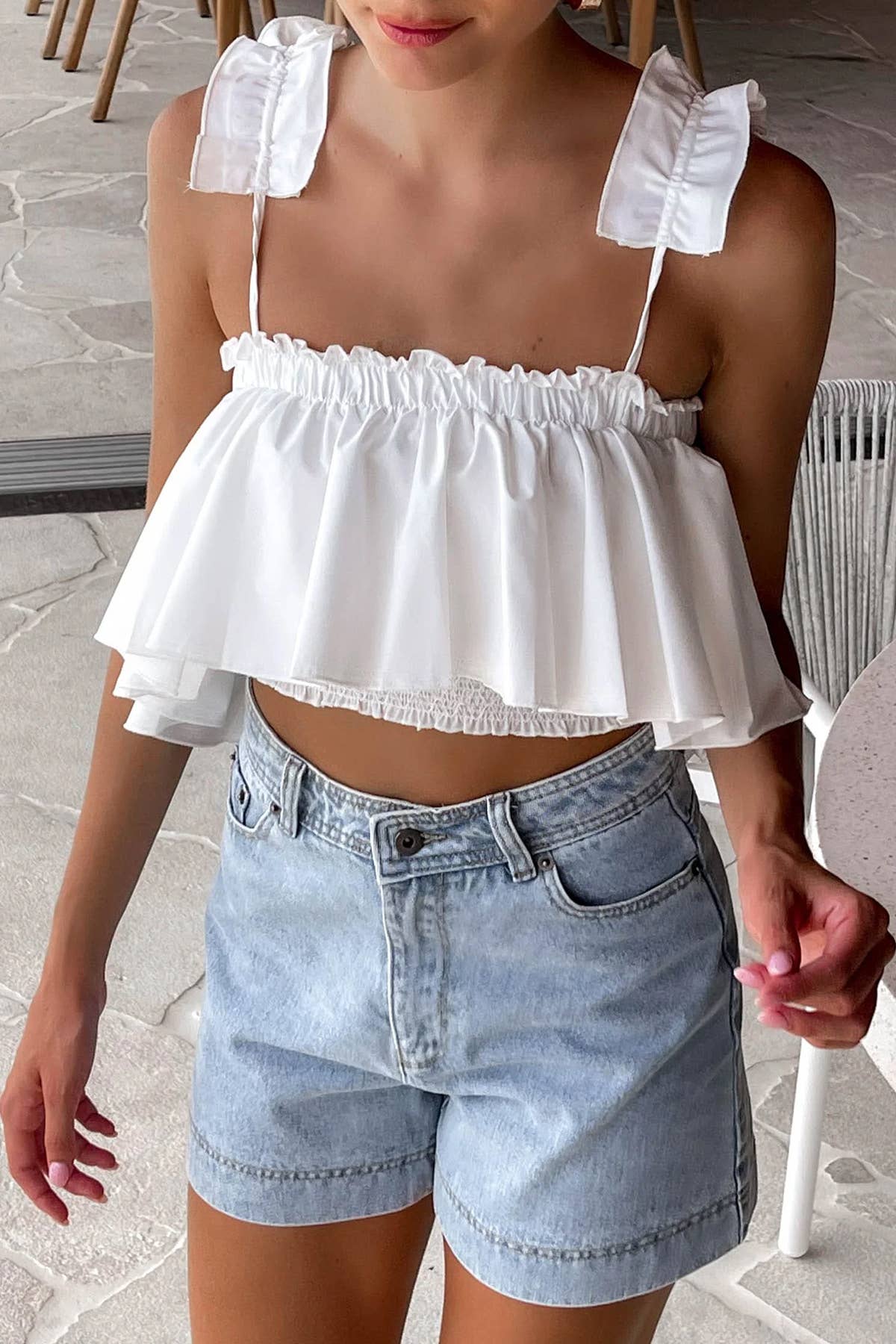 BRANCO T2023ES0016- Top sem mangas sem folho branco cropped para venda a revendedores na Faire2