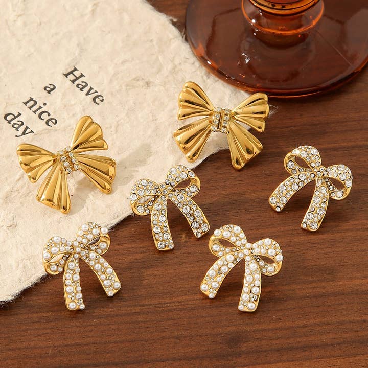 TITANIUM STEEL BOW EARRINGS INLAID WITH RHINESTONES_CWMM3605 for wholesale by ACCITY