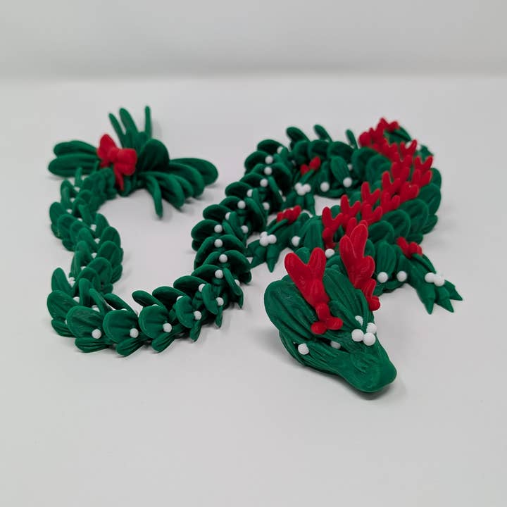 Articulated Missiletoe Dragon Decorative Fidget Toy for wholesale by Giant Turtle Creations