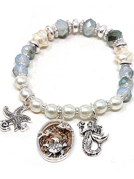 ( W741 ) SEALIFE THEMA STRETCH ARMBAND - MEERJUNGFRAU SEESTERN für den Großhandel von Jewelry Max