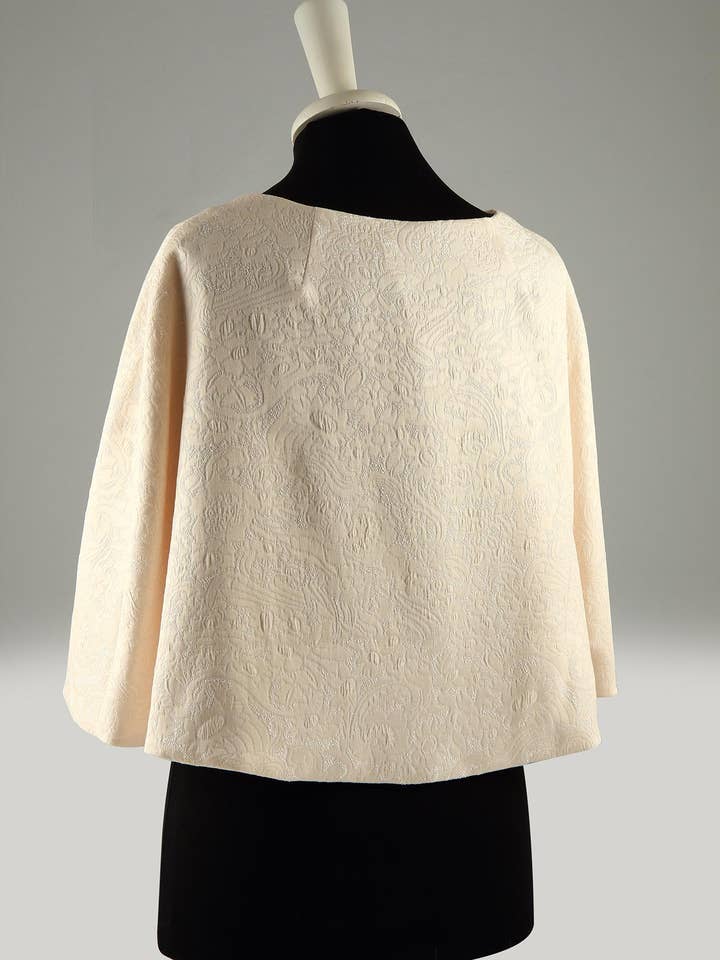 Orchidea – Mantellina per la vendita all'ingrosso da parte di Antonella Valerio