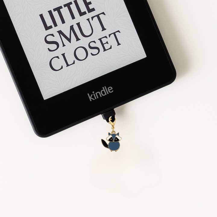 Kindle Dust Plug Raccoon for wholesale by Little Smut Closet