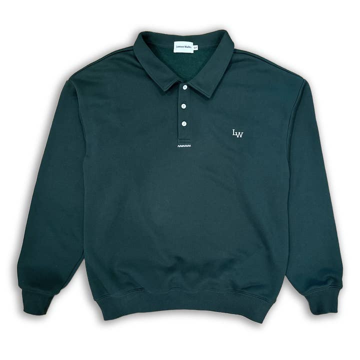 La Felpa con Bottoni a Quarti in Blu Navy per la vendita all'ingrosso da parte di Lemon Walks