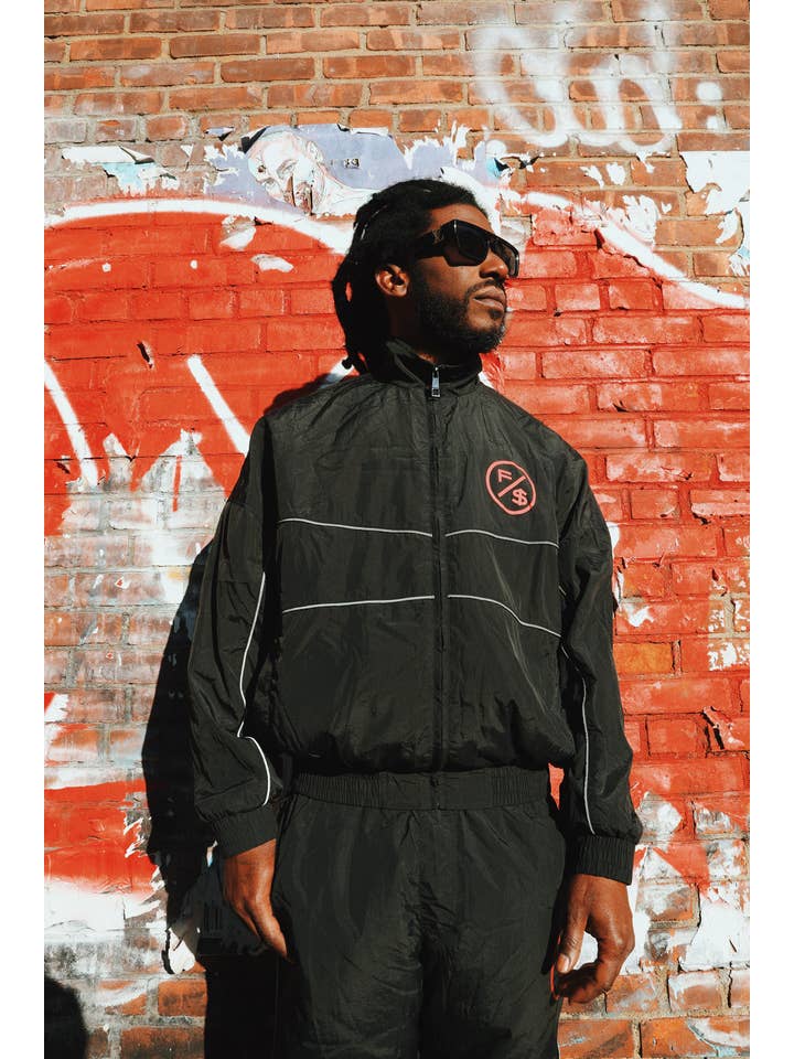 Black Red MOTION Nylon Pants (BRED) for wholesale on Faire8