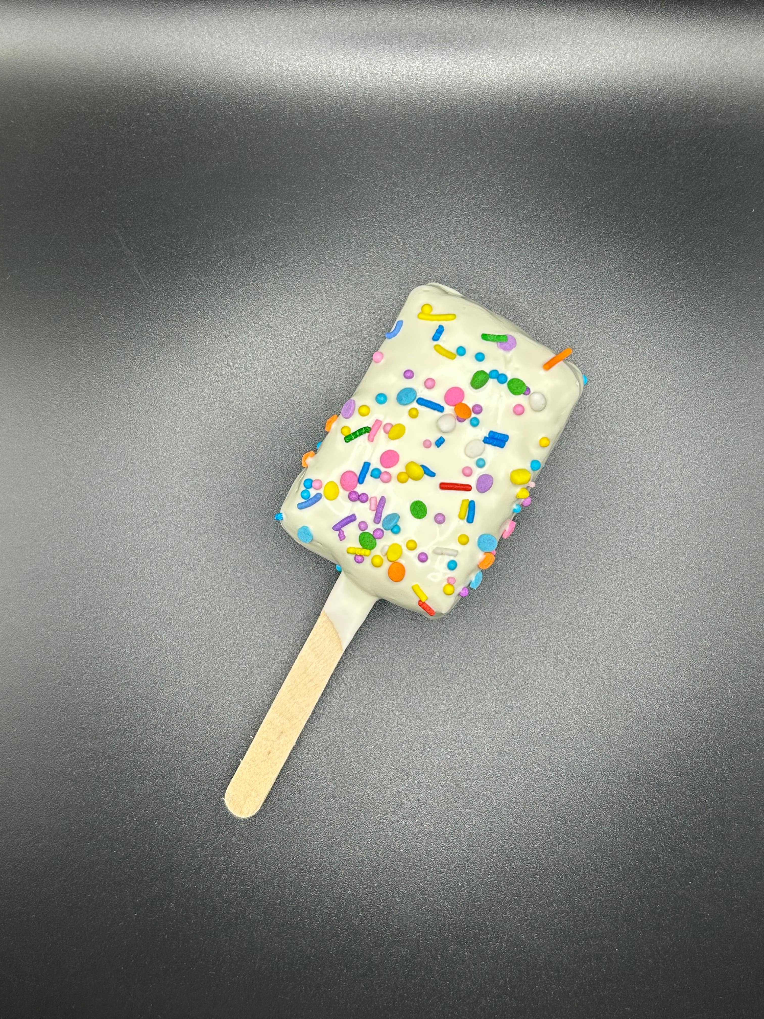 Norm & Lenore - Wholesale Chocolate Covered Sweets - White Chocolate Rice Krispie Square Pop1