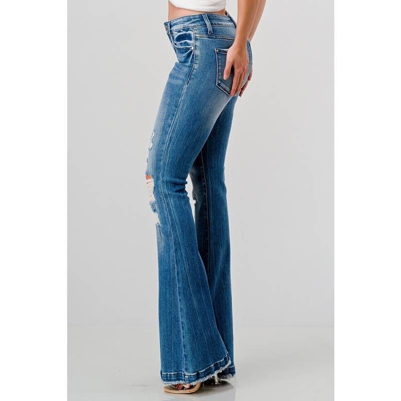 GEMIDDELDE Petite Mid Rise Stretch Tie Flare Jeans -open Pack voor groothandel op Faire4